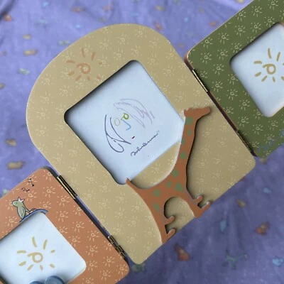 Marco plegable Carter’s John Lennon elefante rinoceronte jirafa música Yoko Ono Foto 1 de 4