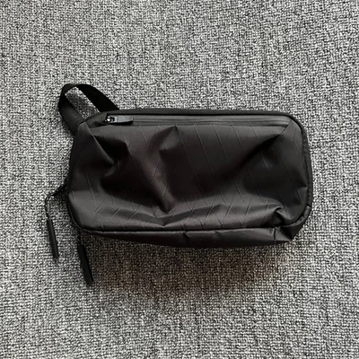 Bolsa Aer Slim X-Pac Negra | Fotos en Excelente Estado del Artículo Real Foto 1 de 4