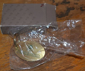 VTG MIB NOS AC Rochester Key Ring 100 Million Catalytic Converters Brass N - Picture 1 of 3