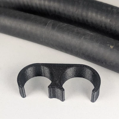 Manguera Calefactora Doble Línea Separador Negro para Mangueras Calefactoras 1) 5/8" y 1) 3/4" Foto 1 de 4