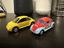 Johnny Lightning 1965 and 2000 Volkswagen VW Beetle,  1:64.