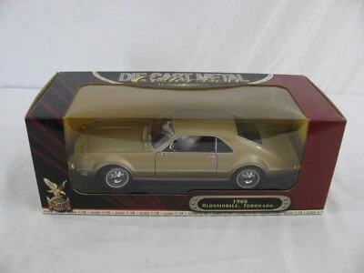 Coche modelo Oldsmobile Toronado 1966 dorado escala 1/18 diecast Road Signature ¡Leer! Foto 1 de 4