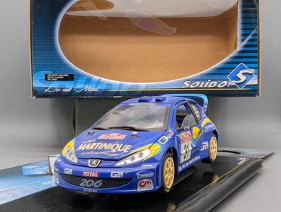 Modellautos 1:18 Solido Peugeot 206 WRC San Remo 2001 #31 J.-J. Boyère mit OVP - Bild 1 von 4