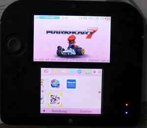 Nintendo 2DS mit vielen Spielen Blau-Schwarz und Hello Kitty Tasche - Top - Bild 1 von 7
