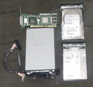 Adaptec SCSI RAID 2120S 64bit Adapter, Chembro SCSI 4HDD Cage and 2 SCSI HDDs - Zdjęcie 1 z 5