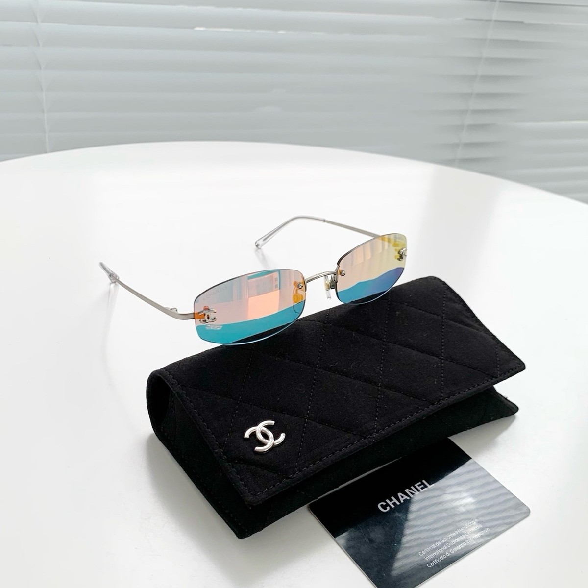 CHANEL ヴィンテージサングラス 4002 CHANEL/シャネル】 4002 色付きレンズ ココマーク フチなし