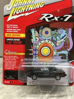 Mazda RX-7 1981 Johnny Lightning clásico dorado - negro Foto 1 de 3