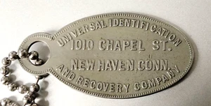Vintage Schlüsselanhänger Anhänger: Universal Identification & Recovery Co; New Haven, Connecticut. - Bild 1 von 2