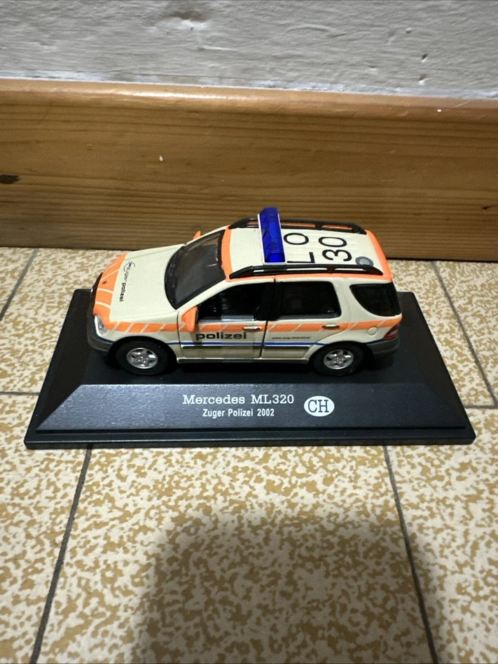 Die cast 1/43 Modellino Auto Police Polizei Mercedes ML 320 Switzerland 2002 - Immagine 1 di 1