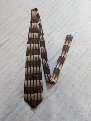 Corbata de diseño Valerio Garati hecha a mano color seda pura oro negro y vino rojo Foto 1 de 4