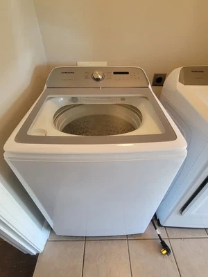 White Samsung High Efficiency Smart Washer & White Electric Dryer (Hoses Inc.) - Image 1 of 4