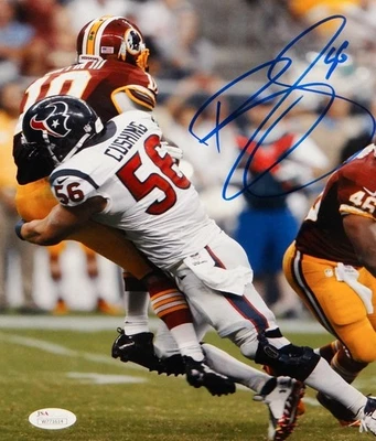 Brian Cushing Autographed 8x10 Tackling Griffin Photo- JSA W Authenticated - Image 1 of 2