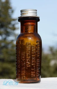 Antique SURGICAL DRESSING Wm Warner BLOWN GLASS bottle w/orig embossed CAP - Bild 1 von 3