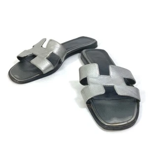 HERMES Oran Zapatos Planos Sandalias Cuero Plateado/Negro - Imagen 1 de 15