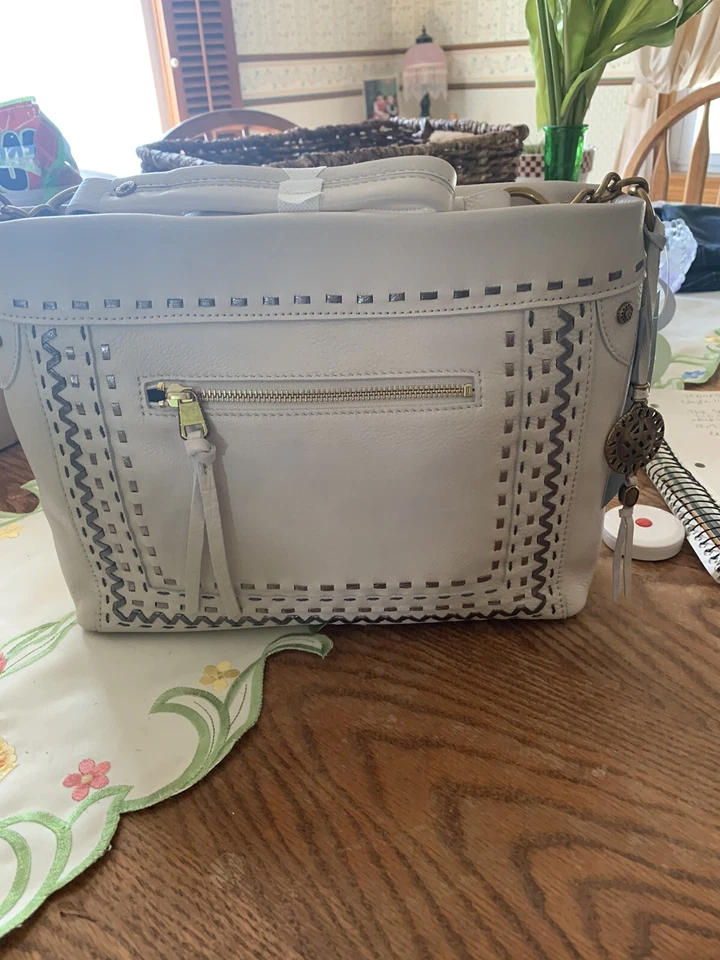 The SAK Tahoe Medium Top Zip Pebbled Leather Metallic Whipstitch Hobo Ivory