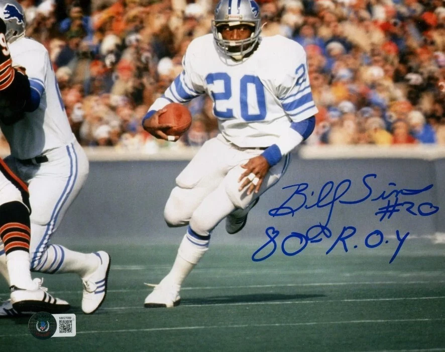 Foto 8x10 firmada por Billy Sims de los Detroit Lions con 80 ROY Beckett Witness certificado de autenticidad #4 Foto 1 de 1