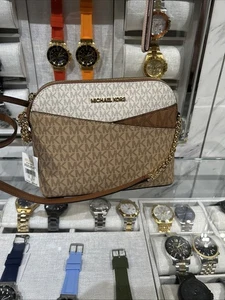 Bandolera Michael Kors Jet Set Mediana X Cúpula PVC - Imagen 1 de 13