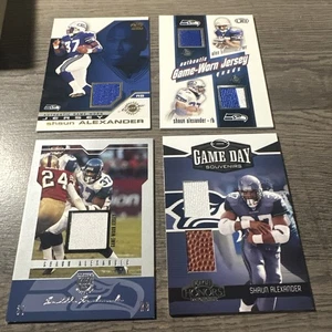SHAUN ALEXANDER GAME USED PATCH LOT 11 SEAHAWKS PACIFIC QUAD + LEAF + TOPPS + - Bild 1 von 6