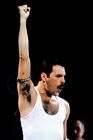 Freddie Mercury iconic in white sleeveless shirt fist in the air 8x10 photo