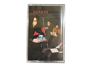 SPARKS - THE GIRL IS CRYING IN HER LATTE CASSETTE Brand New & Sealed - Picture 1 of 3