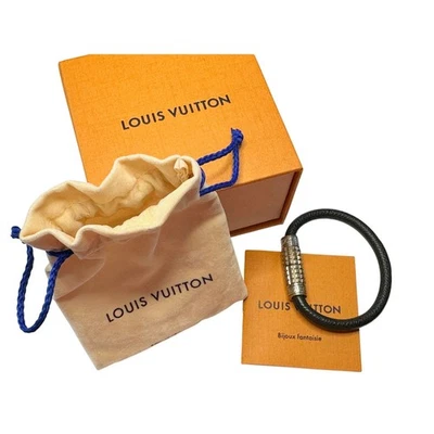 Pulsera digital Louis Vuitton de cuero taiga negra con bolsa antipolvo, caja y folleto de cuidado Foto 1 de 4