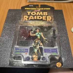 Figura de acción Tomb Raider Lara Croft en tarjeta Toy Biz 1997 nunca abierta de colección - Imagen 1 de 9