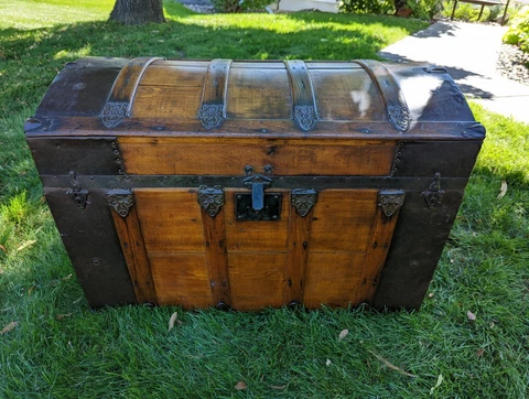Antique Humpback Trunk Refinished  with All Original Hardware & Pressed  Metal Cover