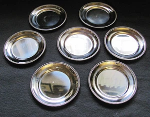 7 Glasuntersetzer WMF Cromargan Kordelrand - Bild 1 von 1