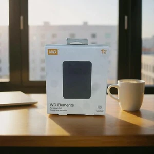 Disque dur externe portable WD Elements 1 To noir - Photo 1/8