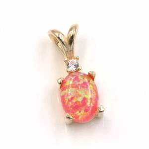 Lab Created Pink Opal 8x6mm Oval Cabochon w/ Accent 14KT Yellow Gold Pendant - Picture 1 of 2