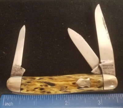 Cuchillo Winchester EE. UU. Serpentine Stockman, asas compuestas de remolino bronceado  Foto 1 de 4