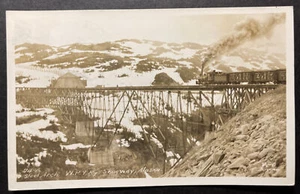 "Arco de acero W P Y Ry Skagway Alaska RPPC 1935 Wrangell ""...un viaje solitario""." - Imagen 1 de 2