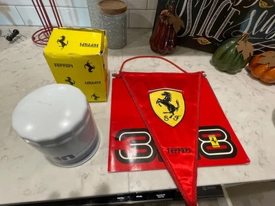 ferrari 124228 oil filter, Ferrari pendant, and 328 book - Image 1 of 4