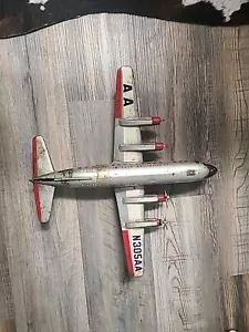 RARO AVIÓN LITOGRÁFICO DE HOJALATA AMERICAN AIRLINES DC-7 BUQUE INSIGNIA CAROLYN N305AA LINEMAR - Imagen 1 de 3