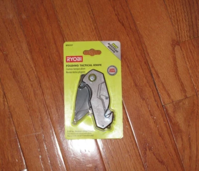 RYOBI presenta el cuchillo táctico plegable compacto con un cuchillo táctico de 2,25 pulgadas Borde recto Foto 1 de 2