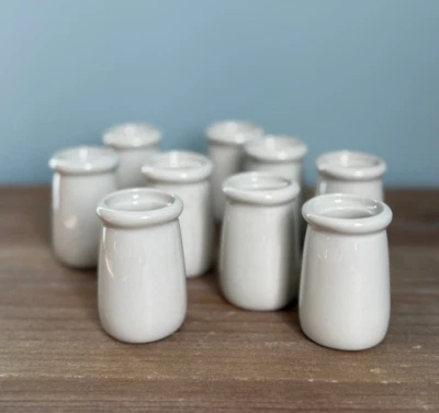 Lot of 9 white ivory Hall Pottery Candlestick Holders Mini Flower Vases 2" Tall - Image 1 of 4