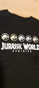 Jurassic World T Shirt Junior Size XS black. Multicolored logos new with tags - Picture 1 of 4
