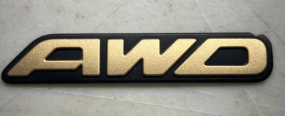 SUBARU OUTBACK AWD REAR HATCH EMBLEM OEM "AWD" TRUNK DECKLID LIFTGATE GATE GOLD - Image 1 of 2