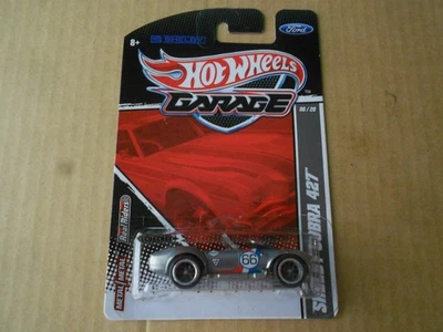 Hot Wheels Garage Shelby Cobra 427 plateado 1/64 nuevo en paquete Real Riders 20/06 Foto 1 de 4