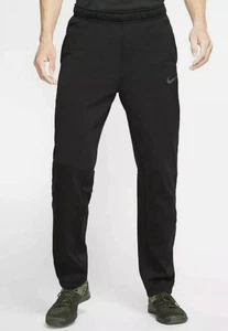 Pantalones deportivos de entrenamiento con dobladillo abierto Nike Therma-FIT talla M negros 932253 010 - Imagen 1 de 11