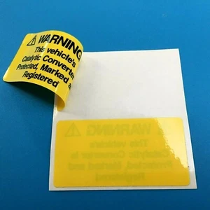 WARNING THIS VEHICLE'S CATALYTIC CONVERTER 'WINDOW STICKERS'   2 off 75mm - Picture 1 of 4