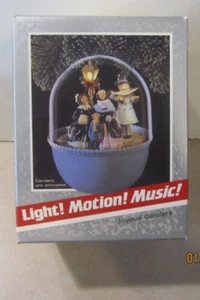 1989 Hallmark ornament Joyous Carolers are animated light and Motion music (NEW) - Picture 1 of 2