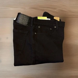 Jeans de mezclilla flexibles ajustados LEVI’S 512 34X36 nuevos con etiquetas Levi Strauss negros 1A - Imagen 1 de 5