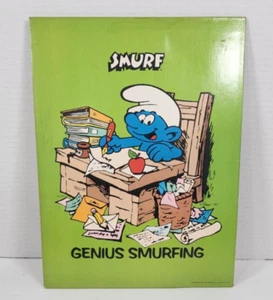 Carpeta de bolsillo Pitufo 1982 vintage cartera de hidromiel genio pitufo - Imagen 1 de 3