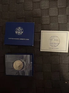 1986  - U.S. Mint Commemorative Liberty Half Dollar - Picture 1 of 7