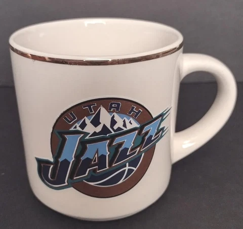 NBA Utah Jazz Ivory with Gold Rim Souvenir Tea Coffee Mug 12 Ounces Cover