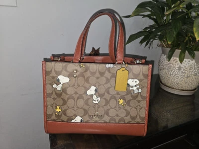 Coach X Peanuts Dempsey Carryall In Signature Canvas With Snoopy Woodstock CE862 - Image 1 of 4