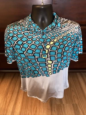 Top de golf JAMIE SADOCK para mujer con estampado de leopardo turquesa y gris talla grande Foto 1 de 4