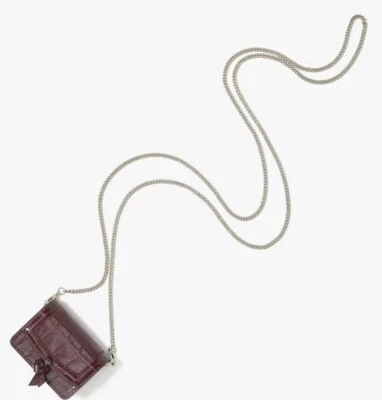 Estuche Bandolera Kate Spade New York Knott Cuero Airpods Pro Collar Baya Oscura Foto 1 de 4