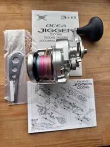 Carrete de baitcasting Shimano 17 OCEA JIGGER 1500HG mango derecho - Imagen 1 de 7